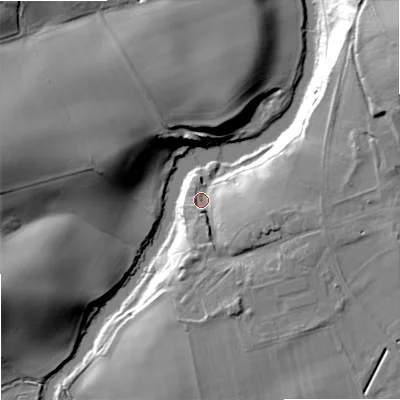 Shaded relief map of the ground around TD124TW, computed from Environment Agency LiDAR. The ground here sits at about 33 m above sea level and falls 35 m across the surrounding 800 m. Surface water reaching this point runs off ground lying to the east-south-east, 11.2 m higher.