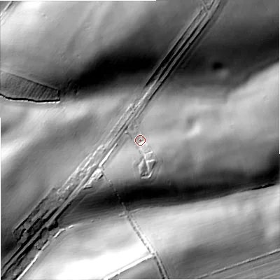 Shaded relief map of the ground around TD124UP, computed from Environment Agency LiDAR. The ground here sits at about 49 m above sea level and falls 32 m across the surrounding 800 m. Surface water reaching this point runs off ground lying to the south, 8.6 m higher.