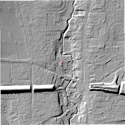 Shaded relief map of the ground around TF118AQ, computed from Environment Agency LiDAR. The ground here sits at about 86 m above sea level and falls 20 m across the surrounding 800 m. Surface water reaching this point runs off ground lying to the west, 6.4 m higher.