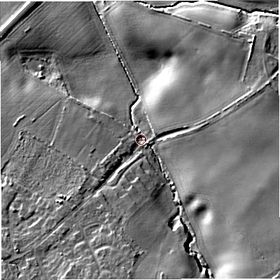 Shaded relief map of the ground around TF28NY, computed from Environment Agency LiDAR. The ground here sits at about 70 m above sea level and falls 16 m across the surrounding 800 m. Surface water reaching this point runs off ground lying to the south-east, 12.9 m higher.