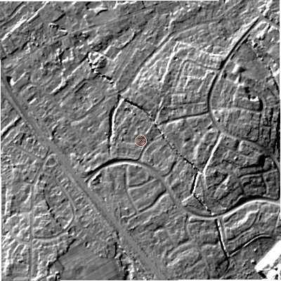 Shaded relief map of the ground around TF28SG, computed from Environment Agency LiDAR. The ground here sits at about 77 m above sea level and falls 22 m across the surrounding 800 m. Surface water reaching this point runs off ground lying to the south-east, 3.3 m higher.