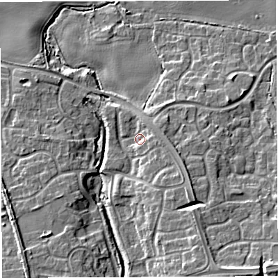 Shaded relief map of the ground around TF50NP, computed from Environment Agency LiDAR. The ground here sits at about 66 m above sea level and falls 15 m across the surrounding 800 m. Surface water reaching this point runs off ground lying to the south-east, 6.3 m higher.
