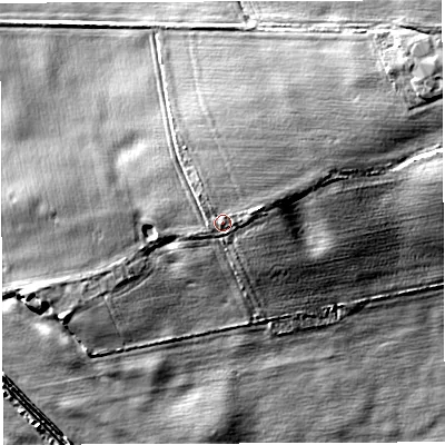 Shaded relief map of the ground around TF66EB, computed from Environment Agency LiDAR. The ground here sits at about 57 m above sea level and falls 11 m across the surrounding 800 m. Surface water reaching this point runs off ground lying to the east-north-east, 2.5 m higher.