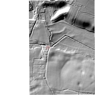 Shaded relief map of the ground around TF92TG, computed from Environment Agency LiDAR. The ground here sits at about 77 m above sea level and falls 20 m across the surrounding 800 m. Surface water reaching this point runs off ground lying to the north-north-west, 4.4 m higher.