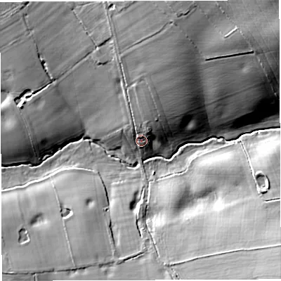 Shaded relief map of the ground around TF92TT, computed from Environment Agency LiDAR. The ground here sits at about 82 m above sea level and falls 25 m across the surrounding 800 m. Surface water reaching this point runs off ground lying to the north-north-east, 11.3 m higher.