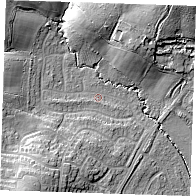 Shaded relief map of the ground around TN103RE, computed from Environment Agency LiDAR. The ground here sits at about 32 m above sea level and falls 25 m across the surrounding 800 m. Surface water reaching this point runs off ground lying to the north-west, 12.7 m higher.