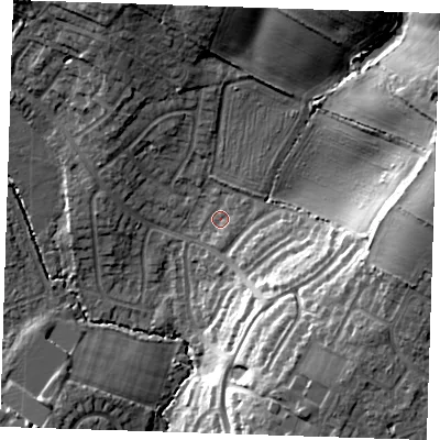Shaded relief map of the ground around TN104AT, computed from Environment Agency LiDAR. The ground here sits at about 29 m above sea level and falls 23 m across the surrounding 800 m. Surface water reaching this point runs off ground lying to the east, 18.6 m higher.