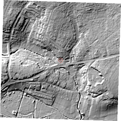 Shaded relief map of the ground around TN104ER, computed from Environment Agency LiDAR. The ground here sits at about 23 m above sea level and falls 19 m across the surrounding 800 m. Surface water reaching this point runs off ground lying to the north, 17.3 m higher.