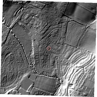 Shaded relief map of the ground around TN104RD, computed from Environment Agency LiDAR. The ground here sits at about 29 m above sea level and falls 21 m across the surrounding 800 m. Surface water reaching this point runs off ground lying to the north, 10.1 m higher.