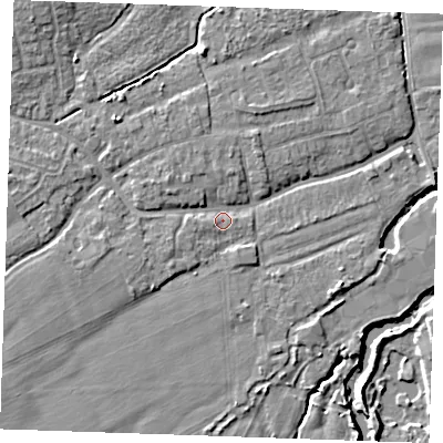 Shaded relief map of the ground around TN125ET, computed from Environment Agency LiDAR. The ground here sits at about 13 m above sea level and falls 7 m across the surrounding 800 m. Surface water reaching this point runs off ground lying to the north-west, 4.9 m higher.