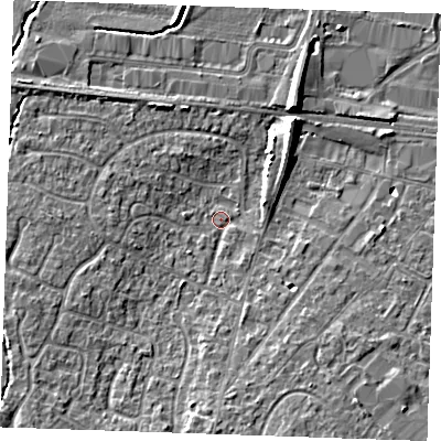 Shaded relief map of the ground around TN126AX, computed from Environment Agency LiDAR. The ground here sits at about 16 m above sea level and falls 7 m across the surrounding 800 m. Surface water reaching this point runs off ground lying to the south, 3.9 m higher.