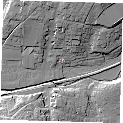 Shaded relief map of the ground around TN221SL, computed from Environment Agency LiDAR. The ground here sits at about 21 m above sea level and falls 31 m across the surrounding 800 m. Surface water reaching this point runs off ground lying to the north, 5.8 m higher.