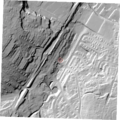 Shaded relief map of the ground around TN23AZ, computed from Environment Agency LiDAR. The ground here sits at about 70 m above sea level and falls 51 m across the surrounding 800 m. Surface water reaching this point runs off ground lying to the south-east, 46.7 m higher.