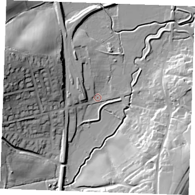 Shaded relief map of the ground around TN325DG, computed from Environment Agency LiDAR. The ground here sits at about 11 m above sea level and falls 42 m across the surrounding 800 m. Surface water reaching this point runs off ground lying to the west-north-west, 39.1 m higher.