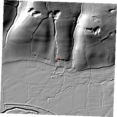 Shaded relief map of the ground around TN325PR, computed from Environment Agency LiDAR. The ground here sits at about 13 m above sea level and falls 47 m across the surrounding 800 m. Surface water reaching this point runs off ground lying to the north, 29.3 m higher.