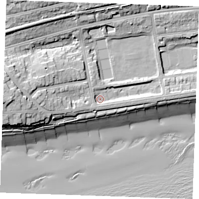 Shaded relief map of the ground around TN393DT, computed from Environment Agency LiDAR. The ground here sits at about 6 m above sea level and falls 21 m across the surrounding 800 m. Surface water reaching this point runs off ground lying to the west, 12.4 m higher.