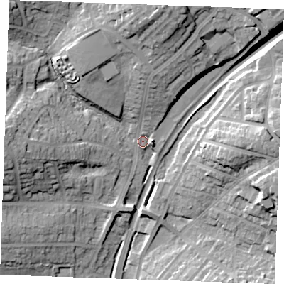 Shaded relief map of the ground around TN394AT, computed from Environment Agency LiDAR. The ground here sits at about 16 m above sea level and falls 29 m across the surrounding 800 m. Surface water reaching this point runs off ground lying to the north, 24.3 m higher.
