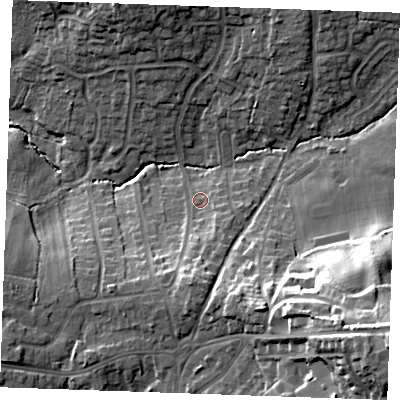 Shaded relief map of the ground around TN394PR, computed from Environment Agency LiDAR. The ground here sits at about 10 m above sea level and falls 33 m across the surrounding 800 m. Surface water reaching this point runs off ground lying to the south, 10.9 m higher.