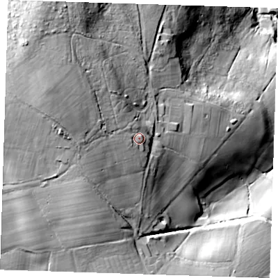 Shaded relief map of the ground around TN63JU, computed from Environment Agency LiDAR. The ground here sits at about 147 m above sea level and falls 77 m across the surrounding 800 m. Surface water reaching this point runs off ground lying to the west, 15.9 m higher.