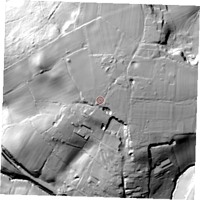 Shaded relief map of the ground around TN63QZ, computed from Environment Agency LiDAR. The ground here sits at about 143 m above sea level and falls 56 m across the surrounding 800 m. Surface water reaching this point runs off ground lying to the east-north-east, 6.1 m higher.
