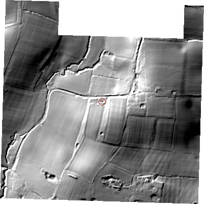 Shaded relief map of the ground around TN87AS, computed from Environment Agency LiDAR. The ground here sits at about 74 m above sea level and falls 31 m across the surrounding 800 m. Surface water reaching this point runs off ground lying to the east-south-east, 11.4 m higher.