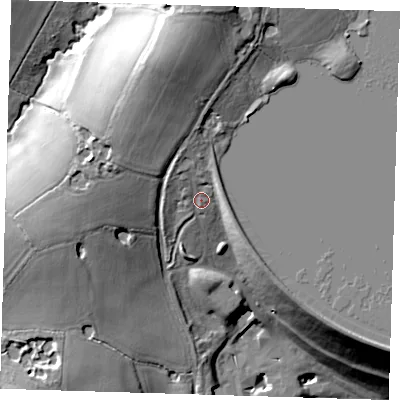 Shaded relief map of the ground around TN87PL, computed from Environment Agency LiDAR. The ground here sits at about 63 m above sea level and falls 30 m across the surrounding 800 m. Surface water reaching this point runs off ground lying to the north, 6.1 m higher.