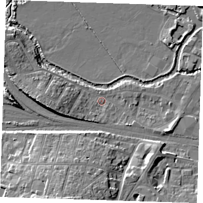 Shaded relief map of the ground around TN91UG, computed from Environment Agency LiDAR. The ground here sits at about 23 m above sea level and falls 18 m across the surrounding 800 m. Surface water reaching this point runs off ground lying to the west, 9.2 m higher.