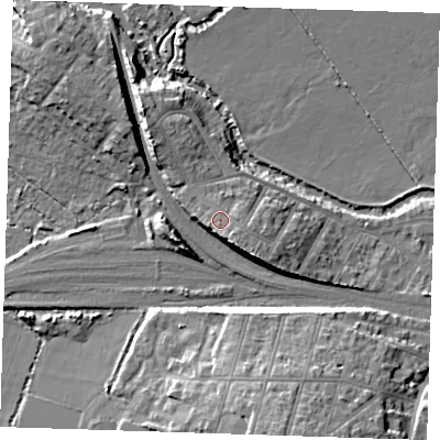 Shaded relief map of the ground around TN91XA, computed from Environment Agency LiDAR. The ground here sits at about 29 m above sea level and falls 16 m across the surrounding 800 m. Surface water reaching this point runs off ground lying to the south-east, 2.3 m higher.