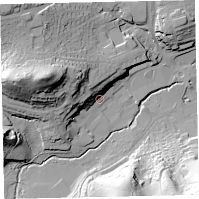 Shaded relief map of the ground around TQ121LZ, computed from Environment Agency LiDAR. The ground here sits at about 9 m above sea level and falls 69 m across the surrounding 800 m. Surface water reaching this point runs off ground lying to the north-west, 36.9 m higher.