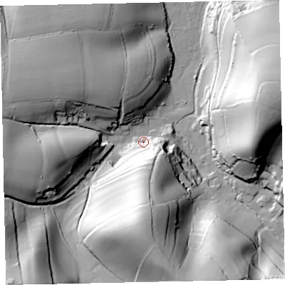 Shaded relief map of the ground around TQ124RG, computed from Environment Agency LiDAR. The ground here sits at about 9 m above sea level and falls 63 m across the surrounding 800 m. Surface water reaching this point runs off ground lying to the south, 57.6 m higher.