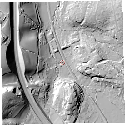 Shaded relief map of the ground around TQ125LD, computed from Environment Agency LiDAR. The ground here sits at about 18 m above sea level and falls 63 m across the surrounding 800 m. Surface water reaching this point runs off ground lying to the west, 38.4 m higher.