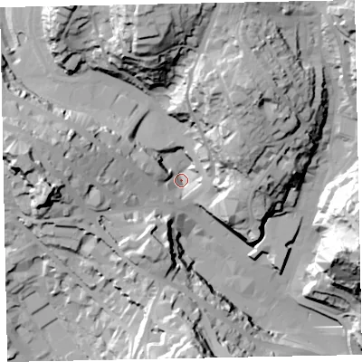 Shaded relief map of the ground around TQ13DR, computed from Environment Agency LiDAR. The ground here sits at about 18 m above sea level and falls 63 m across the surrounding 800 m. Surface water reaching this point runs off ground lying to the west-north-west, 13.8 m higher.