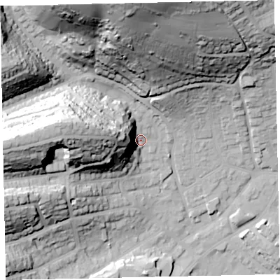 Shaded relief map of the ground around TQ32QN, computed from Environment Agency LiDAR. The ground here sits at about 18 m above sea level and falls 83 m across the surrounding 800 m. Surface water reaching this point runs off ground lying to the west-north-west, 32.1 m higher.