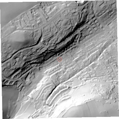 Shaded relief map of the ground around TQ50DD, computed from Environment Agency LiDAR. The ground here sits at about 62 m above sea level and falls 112 m across the surrounding 800 m. Surface water reaching this point runs off ground lying to the south, 66.6 m higher.