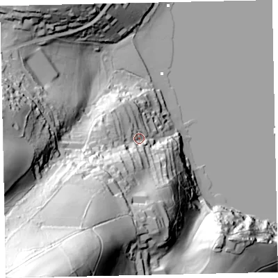 Shaded relief map of the ground around TQ60EX, computed from Environment Agency LiDAR. The ground here sits at about 21 m above sea level and falls 138 m across the surrounding 800 m. Surface water reaching this point runs off ground lying to the south-south-west, 58.6 m higher.