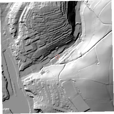 Shaded relief map of the ground around TQ71JL, computed from Environment Agency LiDAR. The ground here sits at about 5 m above sea level and falls 73 m across the surrounding 800 m. Surface water reaching this point runs off ground lying to the east-north-east, 70.6 m higher.
