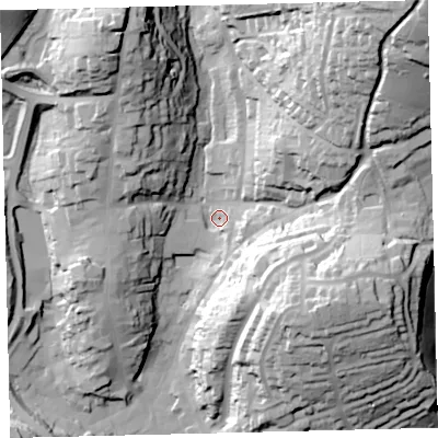 Shaded relief map of the ground around TQ71LX, computed from Environment Agency LiDAR. The ground here sits at about 11 m above sea level and falls 77 m across the surrounding 800 m. Surface water reaching this point runs off ground lying to the north-east, 71.0 m higher.