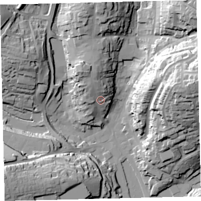 Shaded relief map of the ground around TQ71PG, computed from Environment Agency LiDAR. The ground here sits at about 16 m above sea level and falls 55 m across the surrounding 800 m. Surface water reaching this point runs off ground lying to the north, 11.7 m higher.