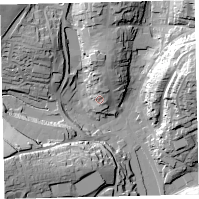 Shaded relief map of the ground around TQ71QD, computed from Environment Agency LiDAR. The ground here sits at about 13 m above sea level and falls 52 m across the surrounding 800 m. Surface water reaching this point runs off ground lying to the north, 9.1 m higher.