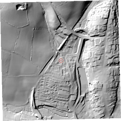 Shaded relief map of the ground around TQ71QX, computed from Environment Agency LiDAR. The ground here sits at about 25 m above sea level and falls 79 m across the surrounding 800 m. Surface water reaching this point runs off ground lying to the west-south-west, 9.0 m higher.