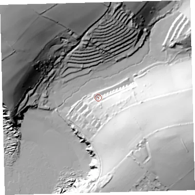 Shaded relief map of the ground around TQ74JB, computed from Environment Agency LiDAR. The ground here sits at about 11 m above sea level and falls 99 m across the surrounding 800 m. Surface water reaching this point runs off ground lying to the south-east, 58.3 m higher.