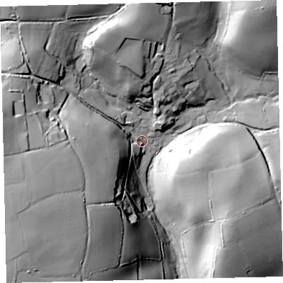 Shaded relief map of the ground around TQ97SW, computed from Environment Agency LiDAR. The ground here sits at about 69 m above sea level and falls 59 m across the surrounding 800 m. Surface water reaching this point runs off ground lying to the west-south-west, 49.4 m higher.
