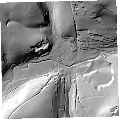 Shaded relief map of the ground around TQ97SX, computed from Environment Agency LiDAR. The ground here sits at about 33 m above sea level and falls 71 m across the surrounding 800 m. Surface water reaching this point runs off ground lying to the south-west, 54.4 m higher.