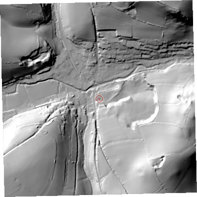 Shaded relief map of the ground around TQ97TP, computed from Environment Agency LiDAR. The ground here sits at about 35 m above sea level and falls 65 m across the surrounding 800 m. Surface water reaching this point runs off ground lying to the south-east, 18.7 m higher.