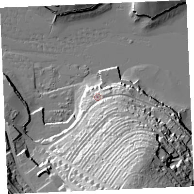 Shaded relief map of the ground around TR112TD, computed from Environment Agency LiDAR. The ground here sits at about 12 m above sea level and falls 55 m across the surrounding 800 m. Surface water reaching this point runs off ground lying to the south-east, 11.4 m higher.