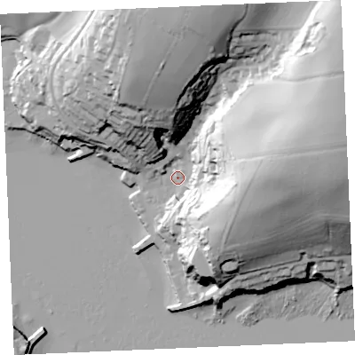 Shaded relief map of the ground around TR115TX, computed from Environment Agency LiDAR. The ground here sits at about 4 m above sea level and falls 69 m across the surrounding 800 m. Surface water reaching this point runs off ground lying to the east-north-east, 63.3 m higher.