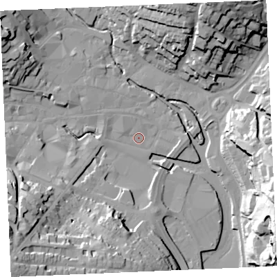 Shaded relief map of the ground around TR12LL, computed from Environment Agency LiDAR. The ground here sits at about 3 m above sea level and falls 40 m across the surrounding 800 m. Surface water reaching this point runs off ground lying to the west-north-west, 2.3 m higher.