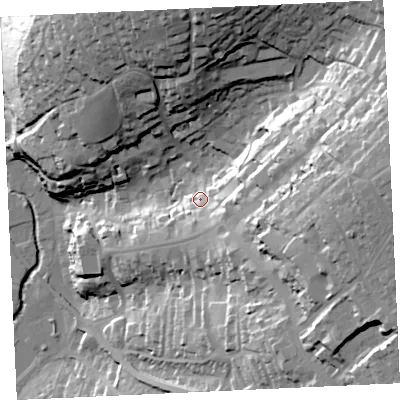 Shaded relief map of the ground around TR138TG, computed from Environment Agency LiDAR. The ground here sits at about 33 m above sea level and falls 73 m across the surrounding 800 m. Surface water reaching this point runs off ground lying to the east, 50.4 m higher.
