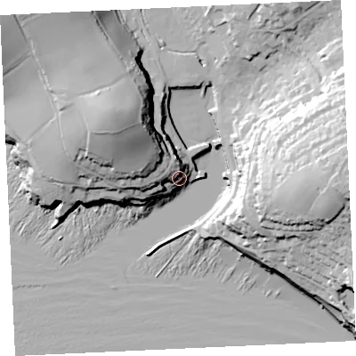 Shaded relief map of the ground around TR139JS, computed from Environment Agency LiDAR. The ground here sits at about 12 m above sea level and falls 57 m across the surrounding 800 m. Surface water reaching this point runs off ground lying to the west-north-west, 11.2 m higher.