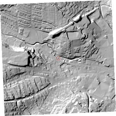 Shaded relief map of the ground around TR13JD, computed from Environment Agency LiDAR. The ground here sits at about 5 m above sea level and falls 56 m across the surrounding 800 m. Surface water reaching this point runs off ground lying to the north-north-west, 34.4 m higher.